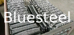 Printemps de torsion personnalisé pour porte à rouleaux avec direction de bobine à droite et type fermé et fin terre